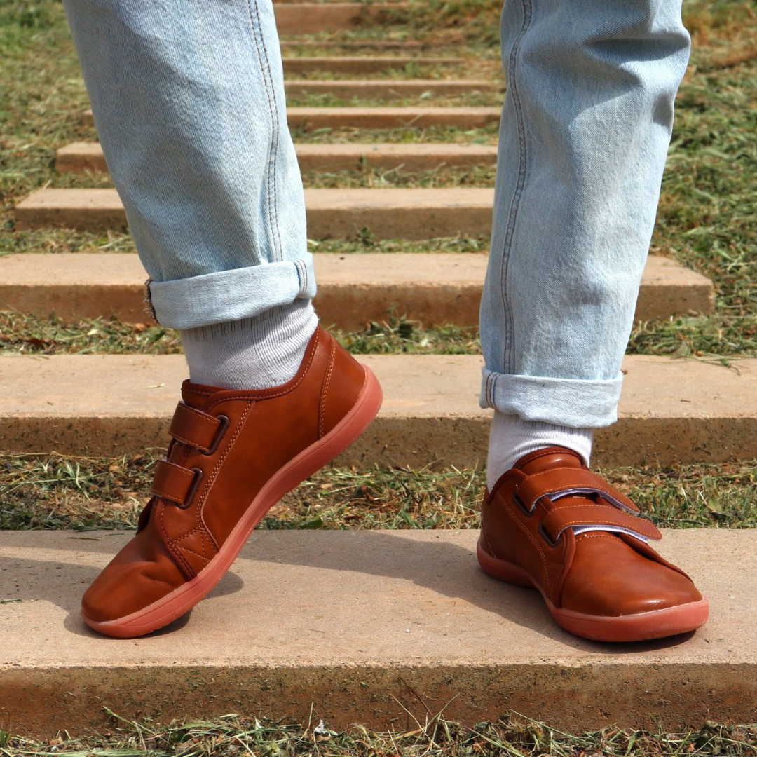 brown velcro barefoot shoes on stairs