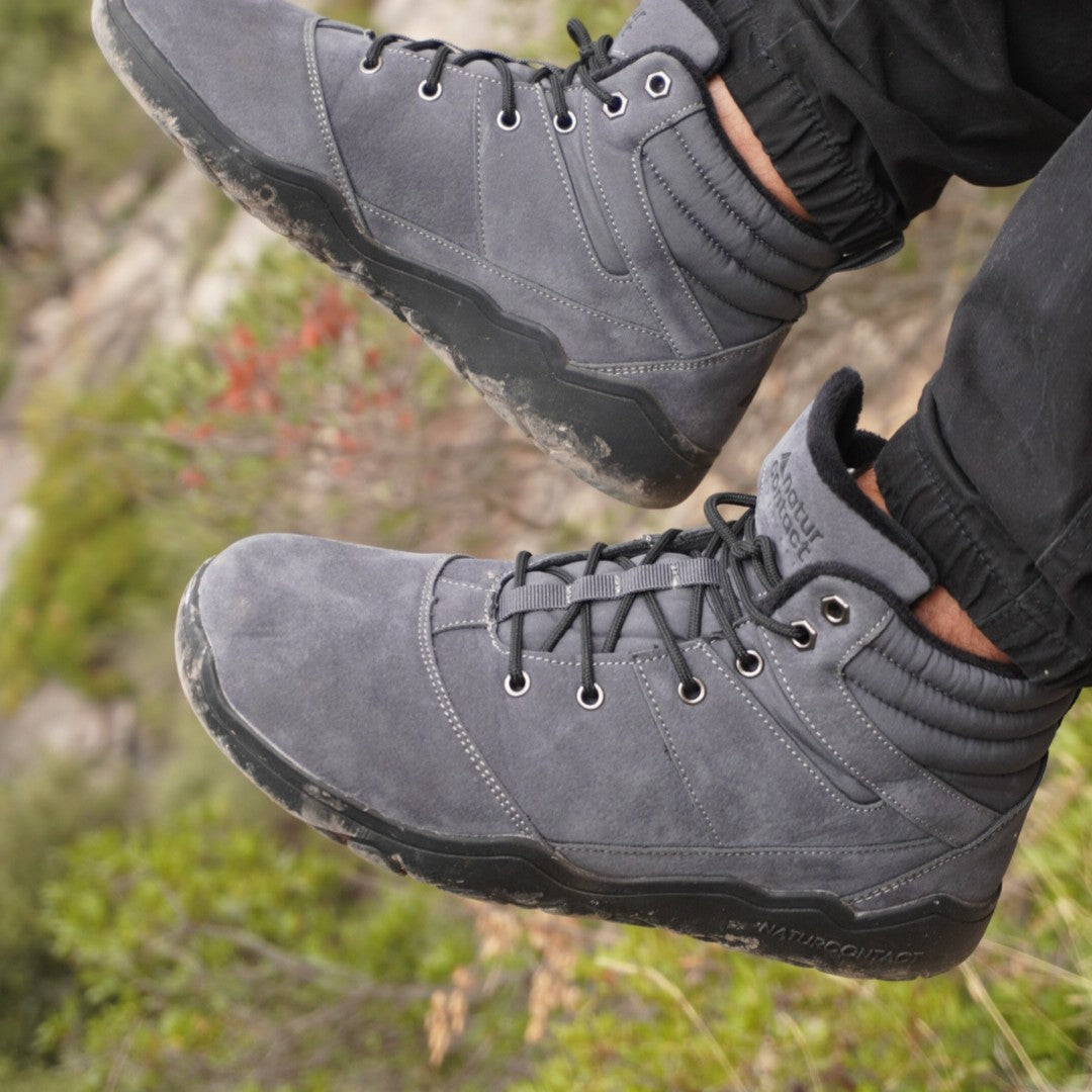 grey men barefoot shoes autumn winter suede on mountain background