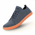 Anthracite barefoot shoes with orange sole on a white background