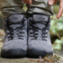 front view grey barefoot shoes ankle top on a rock