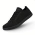 Black barefoot shoes with Naturcontact logo on tongue on a white background