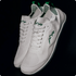 white and green barefoot summer shoes in studio