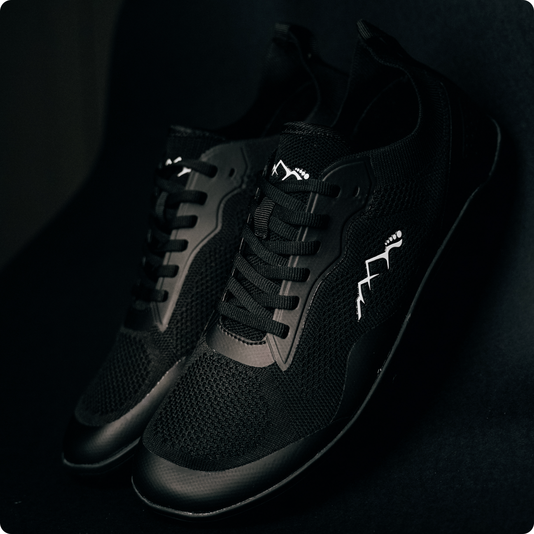 black summer shoes barefoot minimalistic in studio