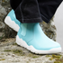 front view of light blue barefoot boots chelsea on a rick