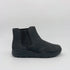 Video of a black Chelsea boot with black sole on a white background
