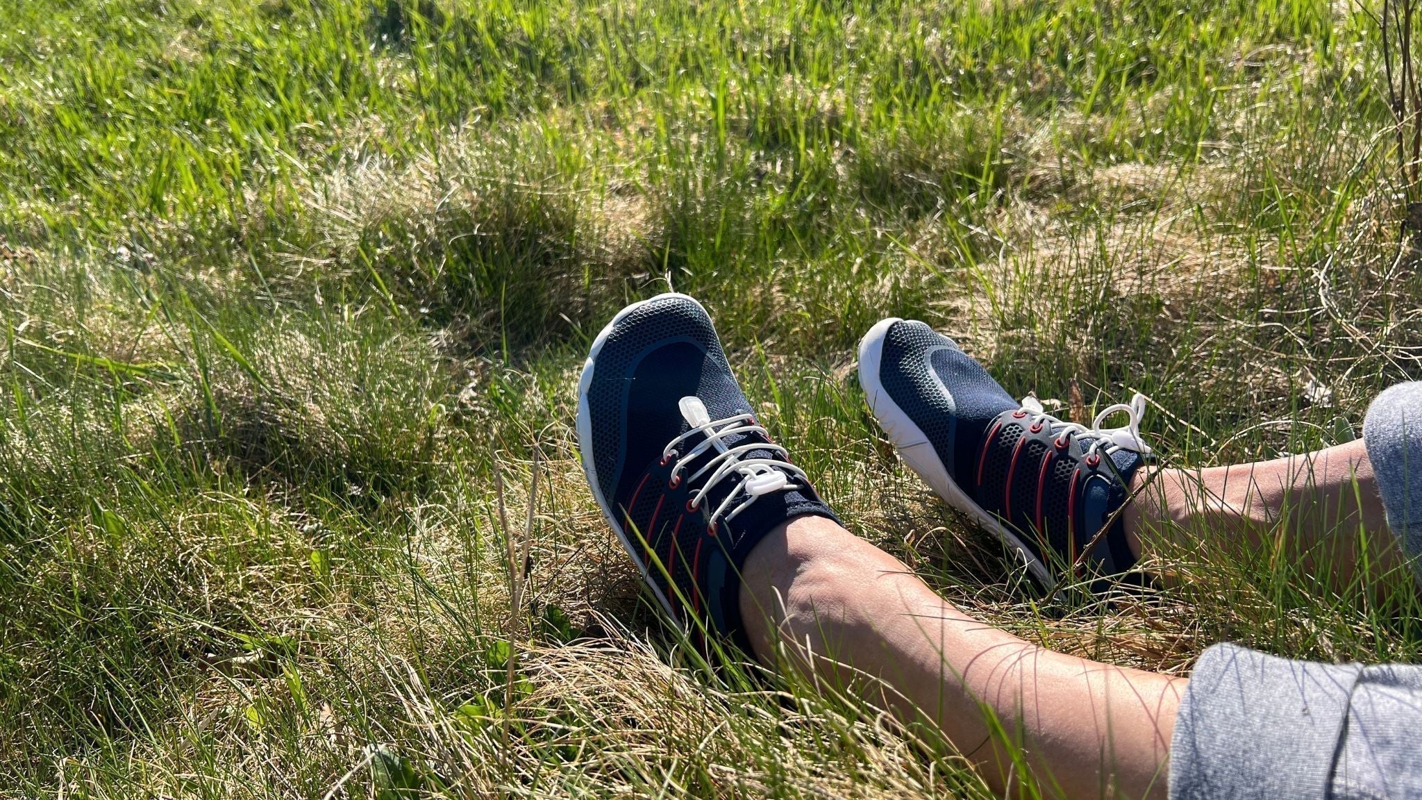 Close up of minimalist barefoot shoes for running showing flexible sole and wide toe box