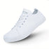White barefoot shoes with a visible brand logo on a white background