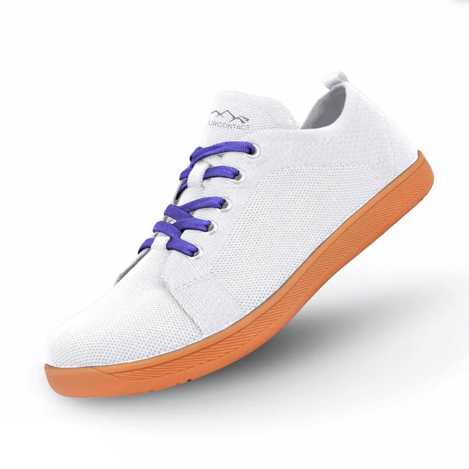 White barefoot shoes with orange sole and purple laces on a white background