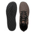 Brown leather boot with black laces on a white background