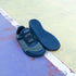 Military Green Barefoot shoes with basketball on sports court, showing sole details