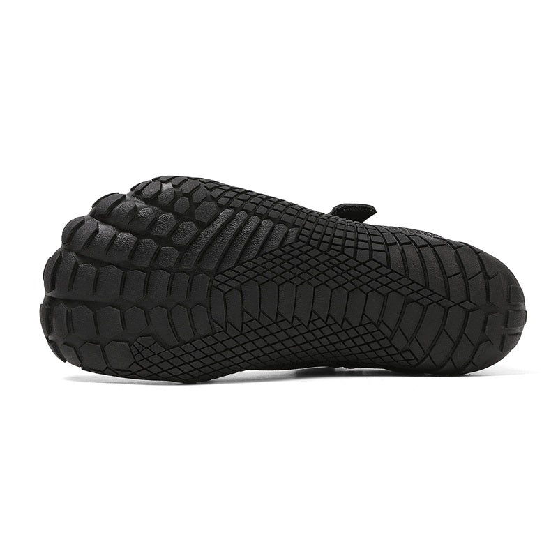 Black athletic barefoot shoe for kids and black sole details 