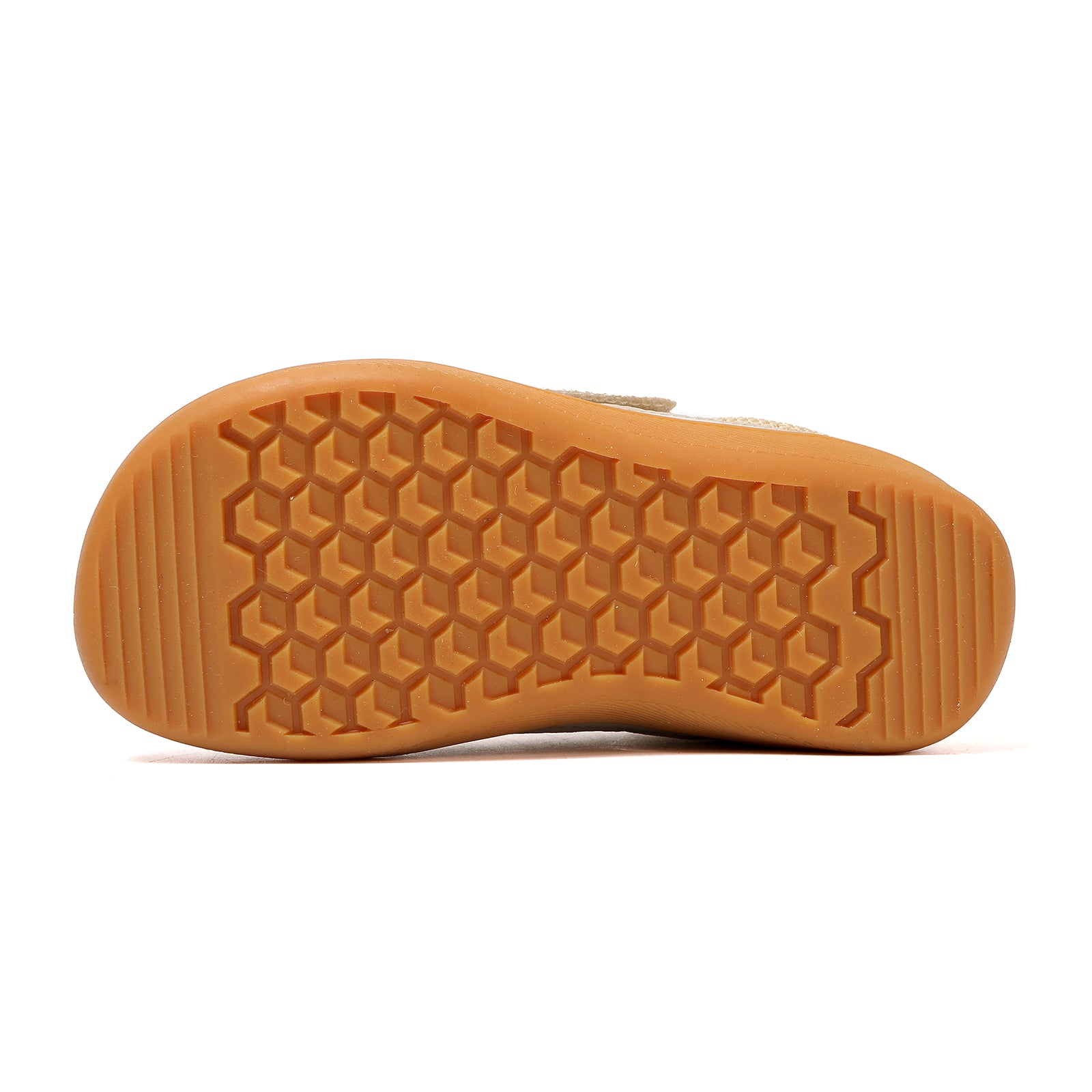 Close-up of a barefoot kids shoe sole details with a textured pattern 