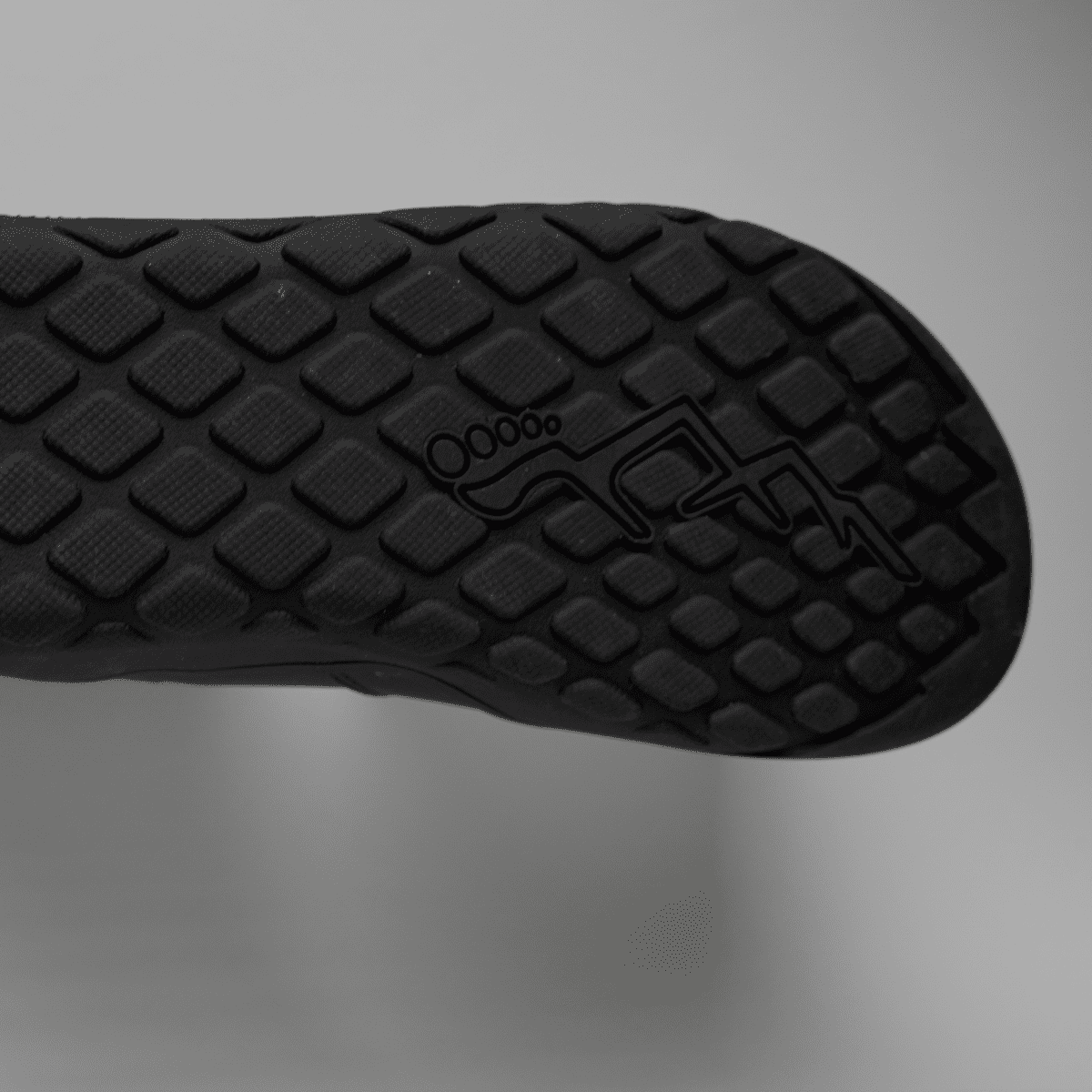 Black sole of barefoot chelsea boots from the bottom view