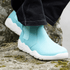 front view of Light Blue barefoot boots chelsea on a rick