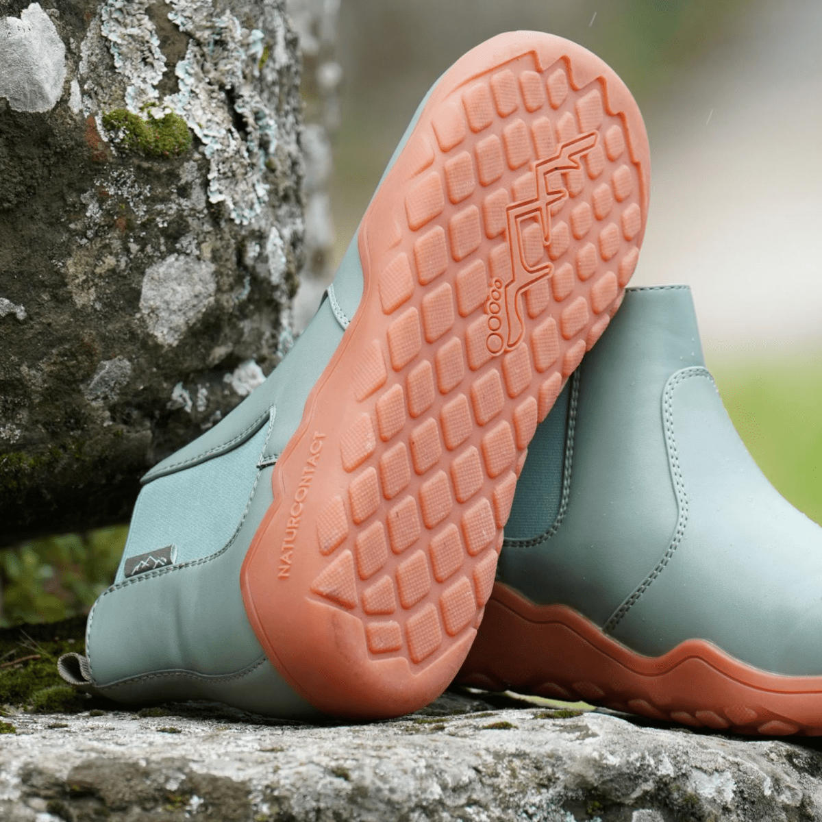 orange sole details of chelsea barefoot boots for outdoor in Sage Green