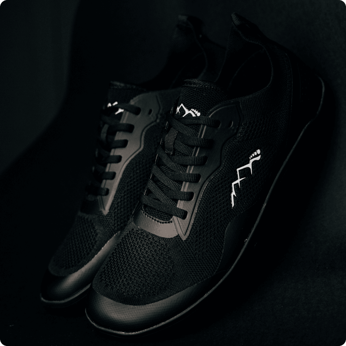 black summer shoes barefoot minimalistic in studio