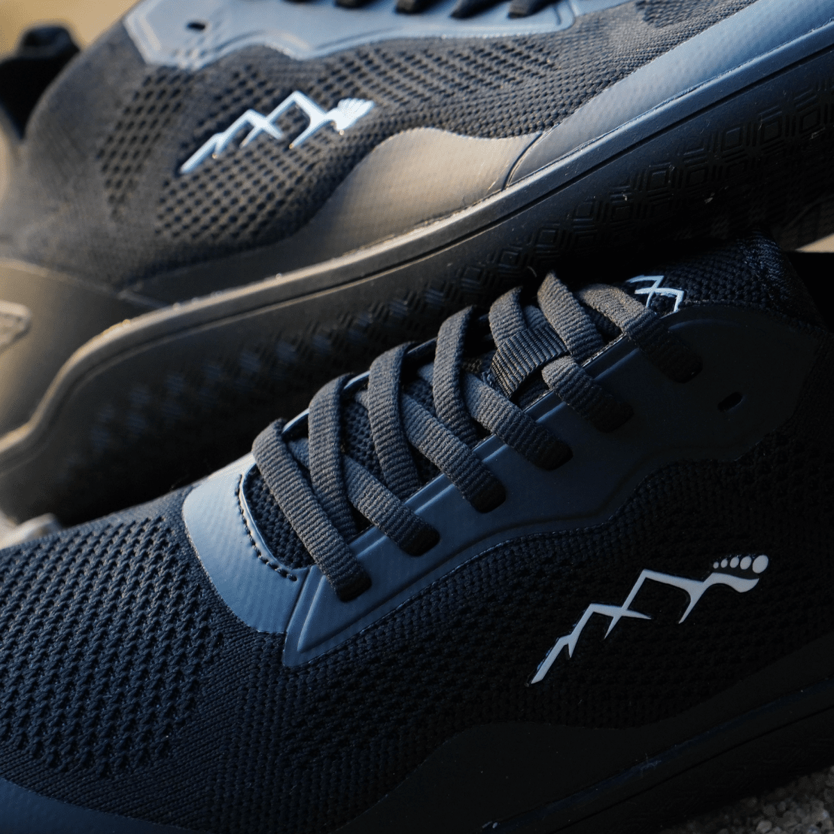 black barefoot shoes laces detail