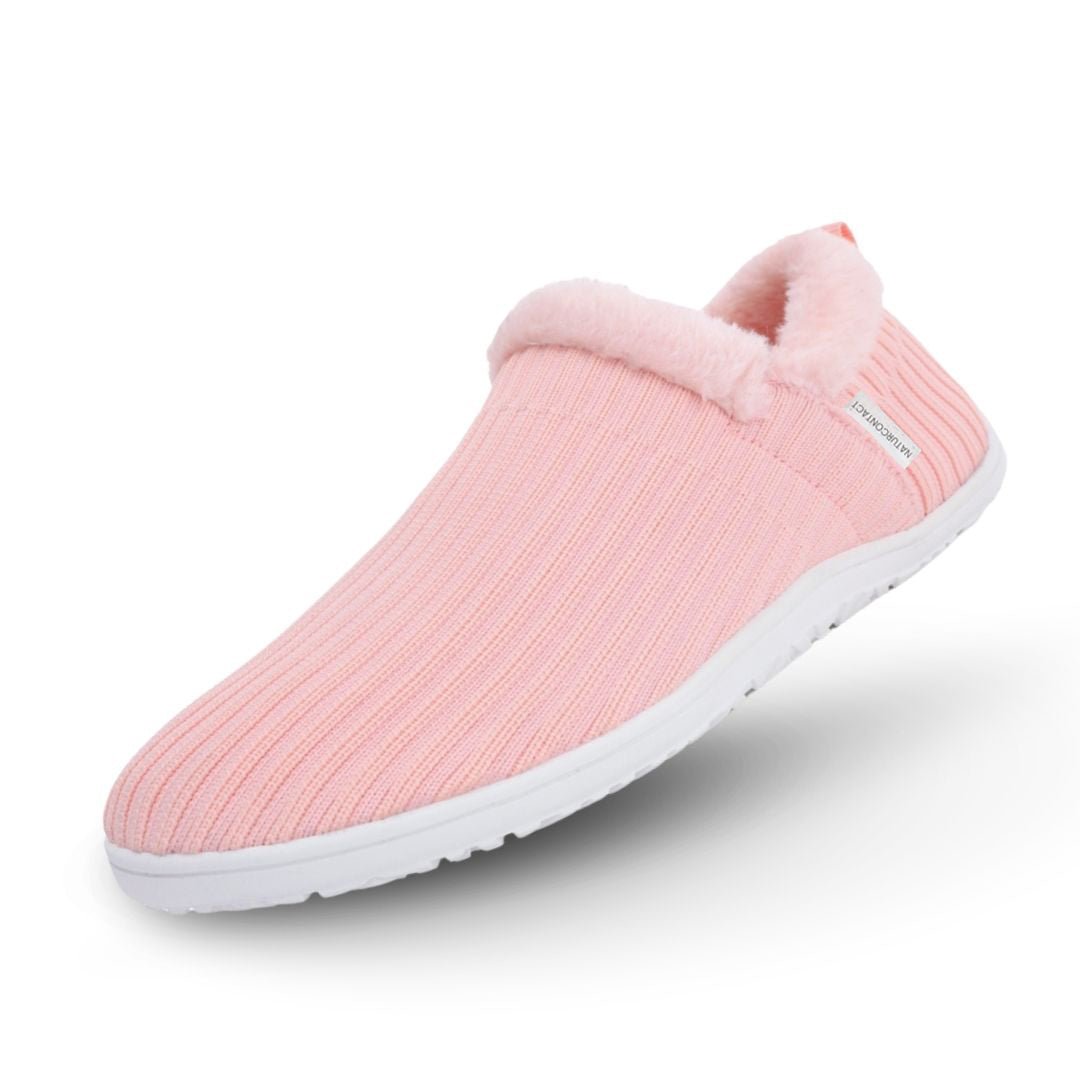 Pink barefoot slipper with white sole on a white background