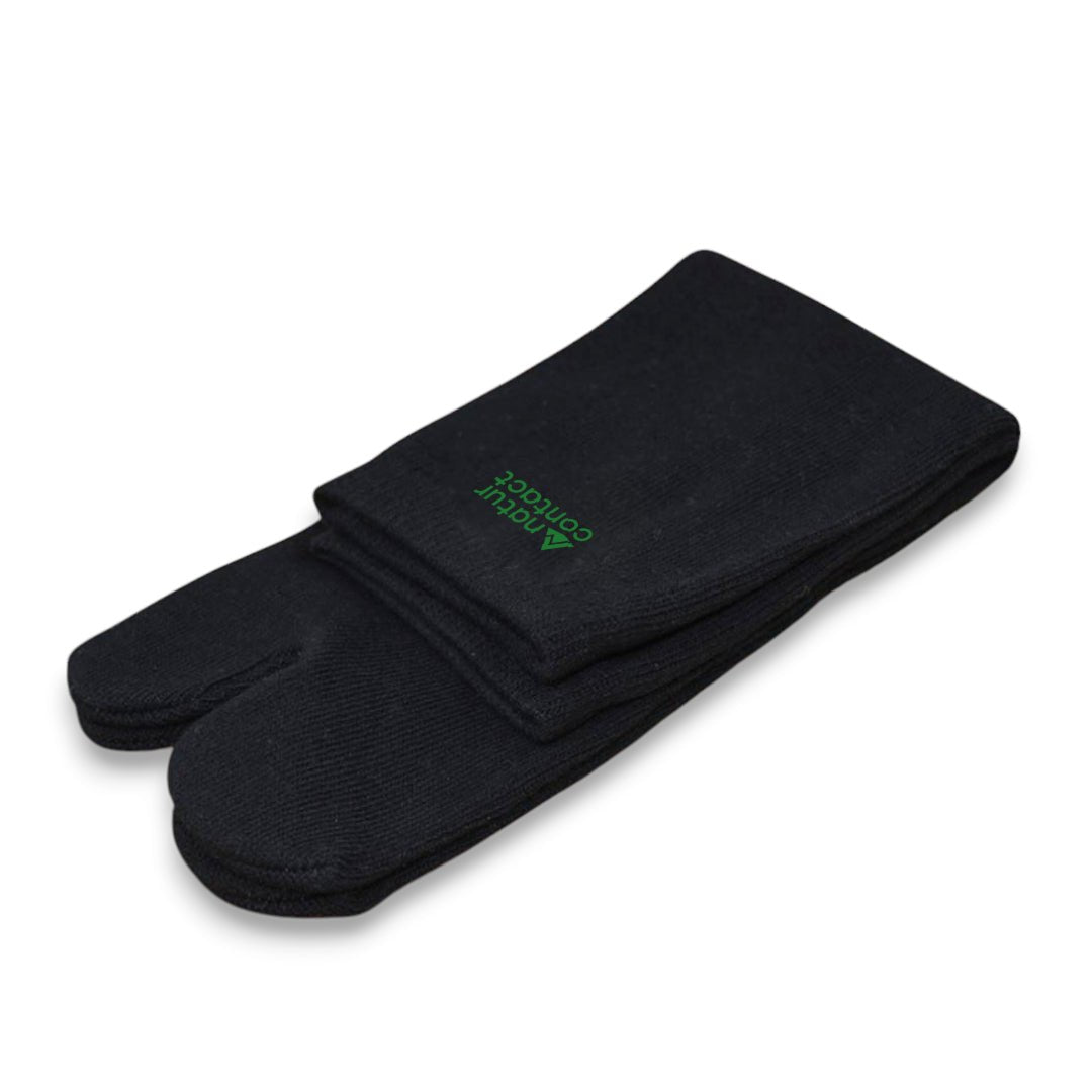 Pair of black socks with a green logo on a white background