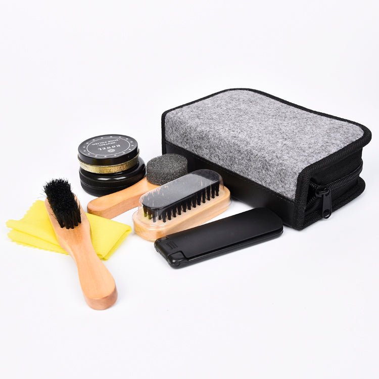 Set of shoe cleaning tools including a brush, cloths, and a case on a white background shoe-cleaning-set