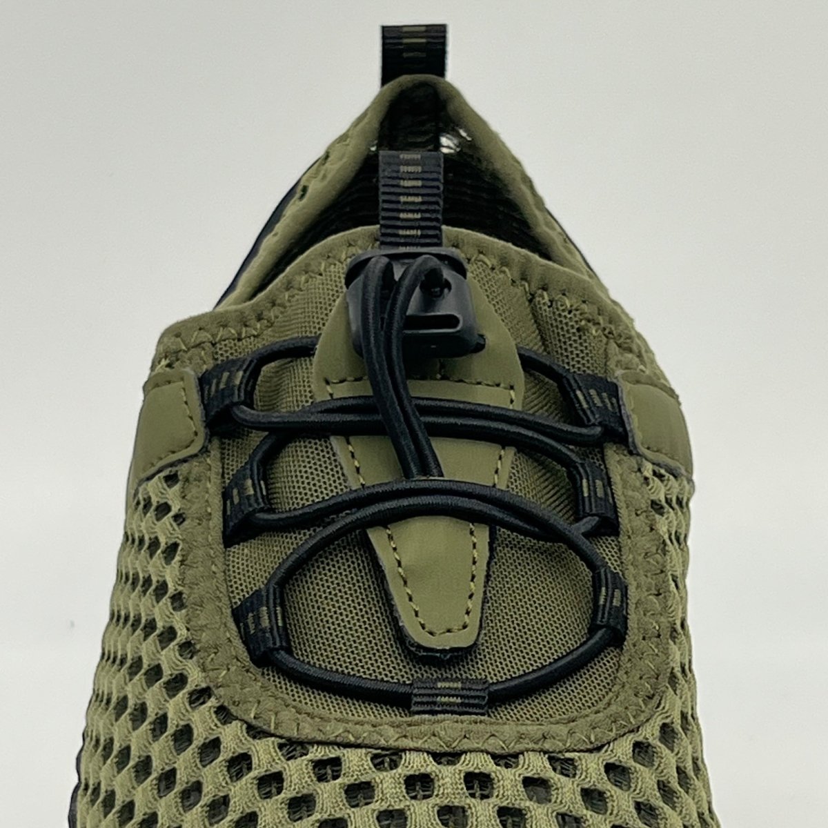 Military green hiking trekking barefoot shoes Naturcontact detail of the laces and tongue of the shoe