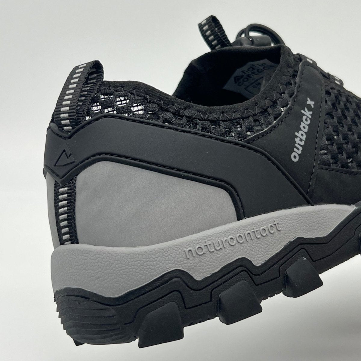Black hiking trekking barefoot shoes Naturcontact back details of the shoe