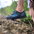 Blue hiking trekking barefoot shoes worn on the top