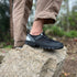 side view of hiking barefoot minimalist shoes black with elastic closure