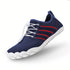 Navy blue athletic sport barefoot shoes with white sole and red accents on a white background