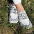 top view sport white blue summer barefoot minimalist shoes on grass