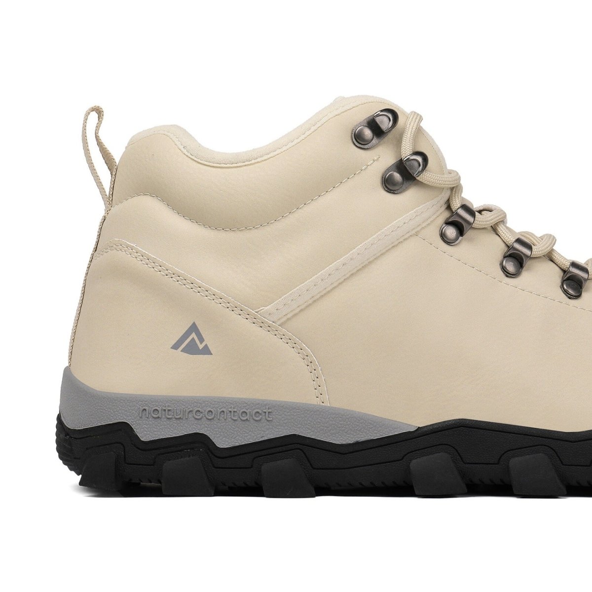 Sand hiking boot with black sole on a white background