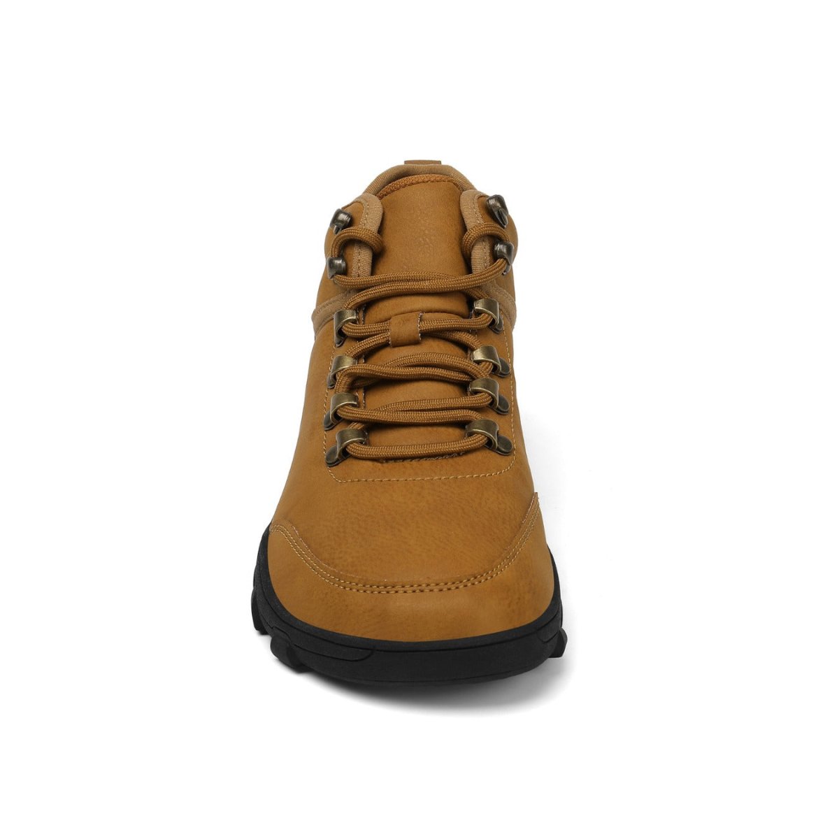 Tan boot with black sole on a white background