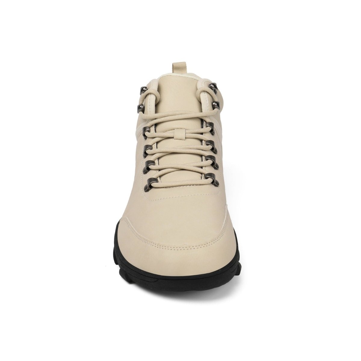 Beige boot with black sole on a white background