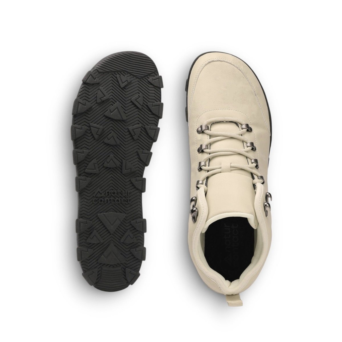 Sand shoe with black sole on a white background