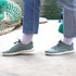 side view of sage green summer barefoot minimalist shoes