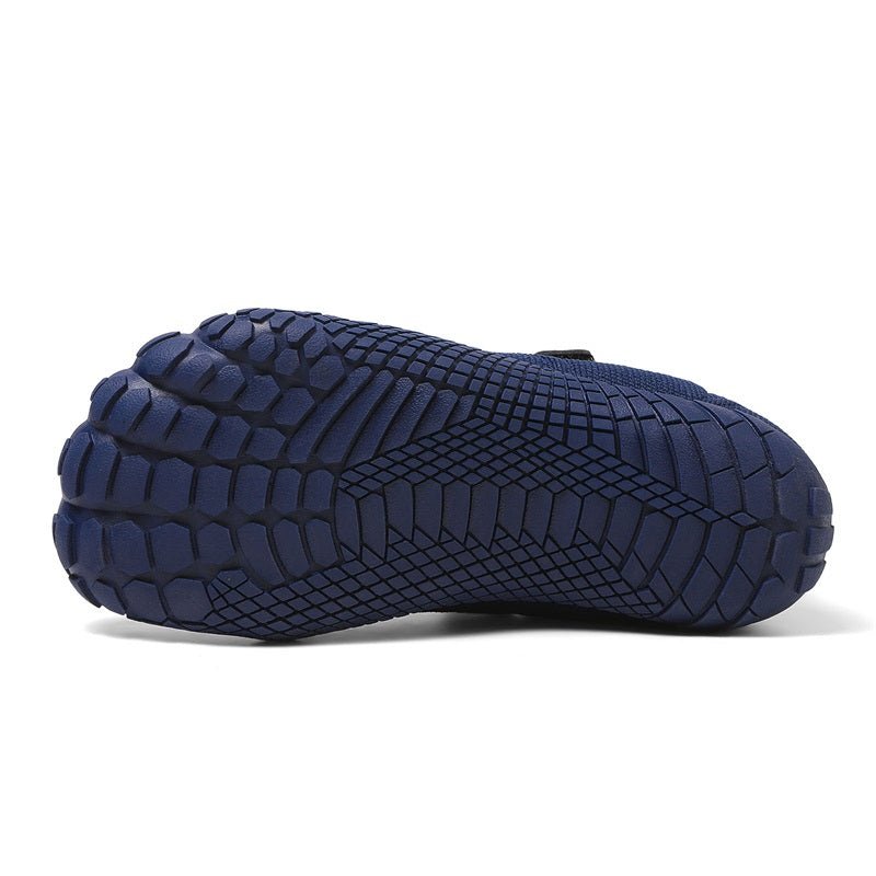 Navy blue barefoot sole of a shoe on a white background