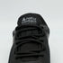 black daily barefoot shoes with detail shot of the shoe laces and tongue