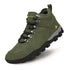 An olive green mid-cut hiking boot with black laces, silver metal eyelets, a black and gray sole, and a small yellow logo on the side, shown on a white background.