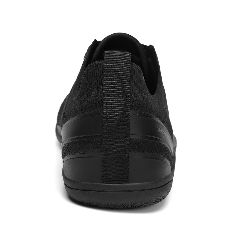 Rear view of Aramid Contact 3.0 barefoot shoes in black with supportive heel design
