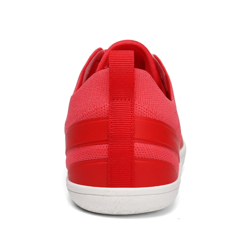 Rear view of Aramid Contact 3.0 barefoot shoes in coral red with supportive heel design