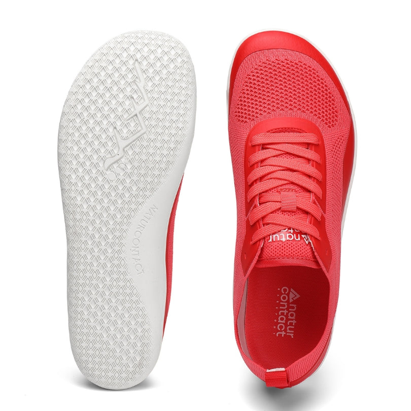 Sole and top view of Aramid Contact 3.0 barefoot shoes in coral red with non-slip outsole