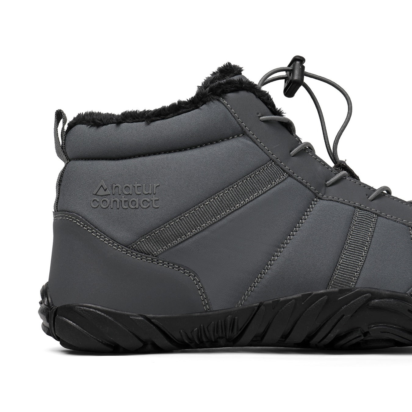 Grey winter boot with fur lining on a white background, featuring the natur contact brand.