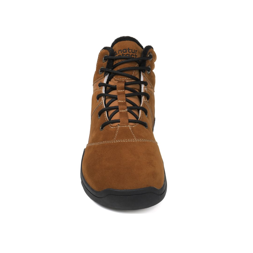 Gold winter barefoot shoe with black laces on a white background, featuring 'Naturcontact' branding. front view.