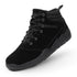 Black winter barefoot shoe with black laces on a white background, featuring 'Naturcontact' branding. angled side view.