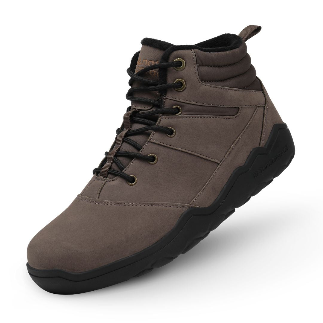Dark brown winter barefoot shoe with black laces on a white background, angled side view.