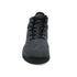 Grey winter barefoot shoe with black laces on a white background, featuring 'Naturcontact' branding. front view.