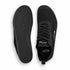 Top and outsole views of black Aramid Contact 2.0 barefoot shoes showing the lace-up upper and textured black tread pattern.