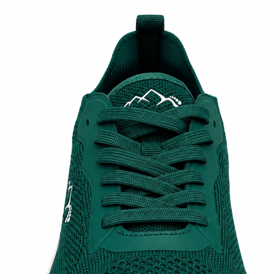 Close-up of the forest green Aramid Contact 2.0 shoe lacing, tongue logo and perforated knit upper.
