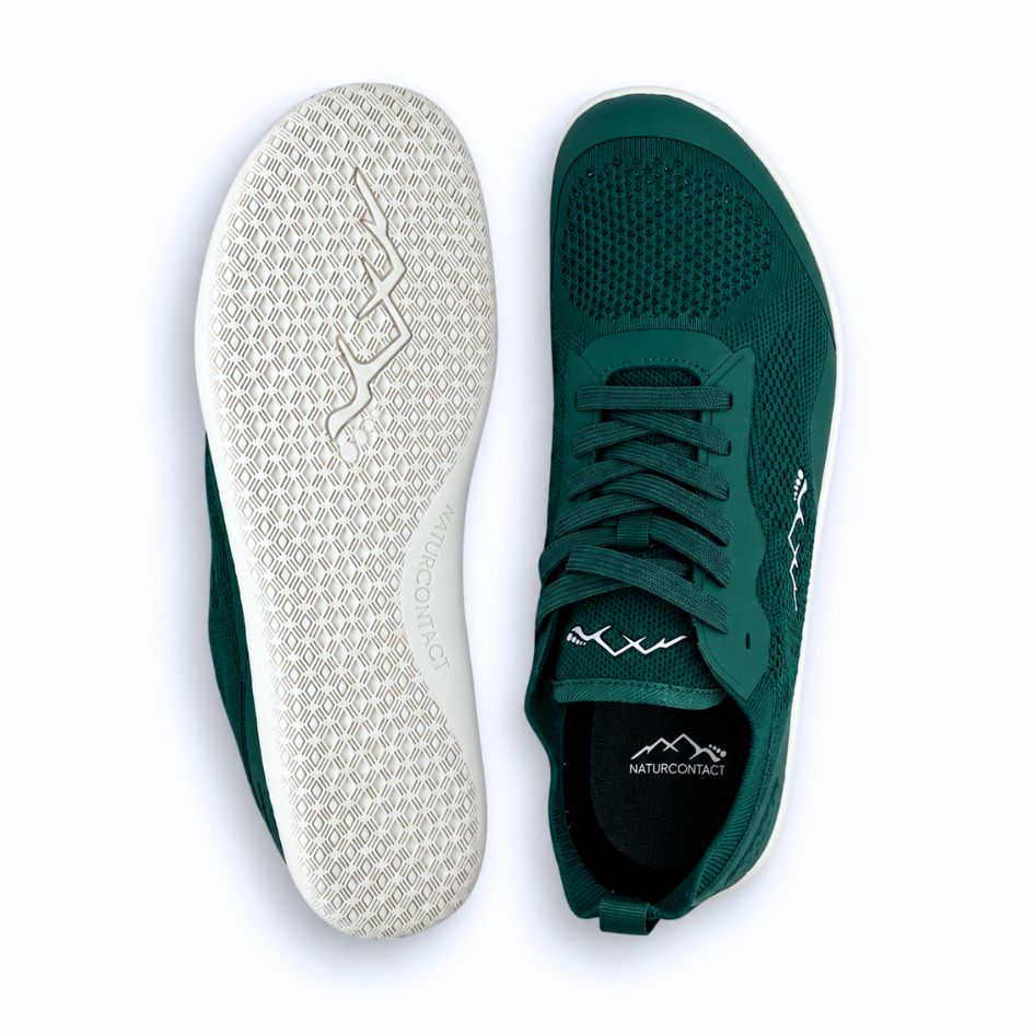 Top and outsole views of forest green Naturcontact Aramid Contact 2.0 barefoot shoes, showing the lacing, rounded toe box and textured light-coloured sole.