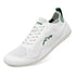 Three-quarter view of white Naturcontact Aramid Contact 2.0 barefoot trainers with green accents, breathable mesh upper and flexible white sole.